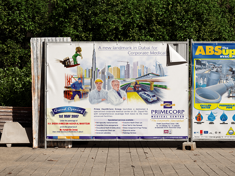 Outdoor project billboard displaying engineering illustrations, infrastructure concepts, and construction-related visuals