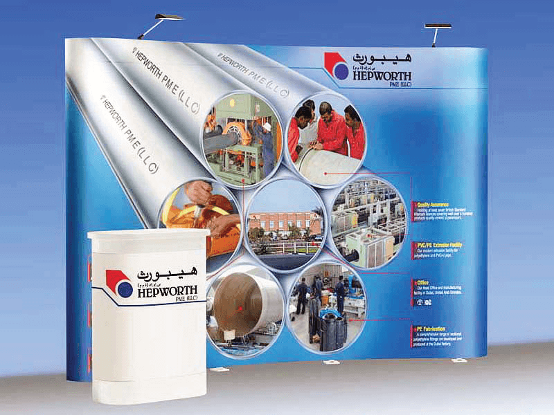 Corporate promotional display featuring industrial services, infrastructure visuals, and business communication graphics